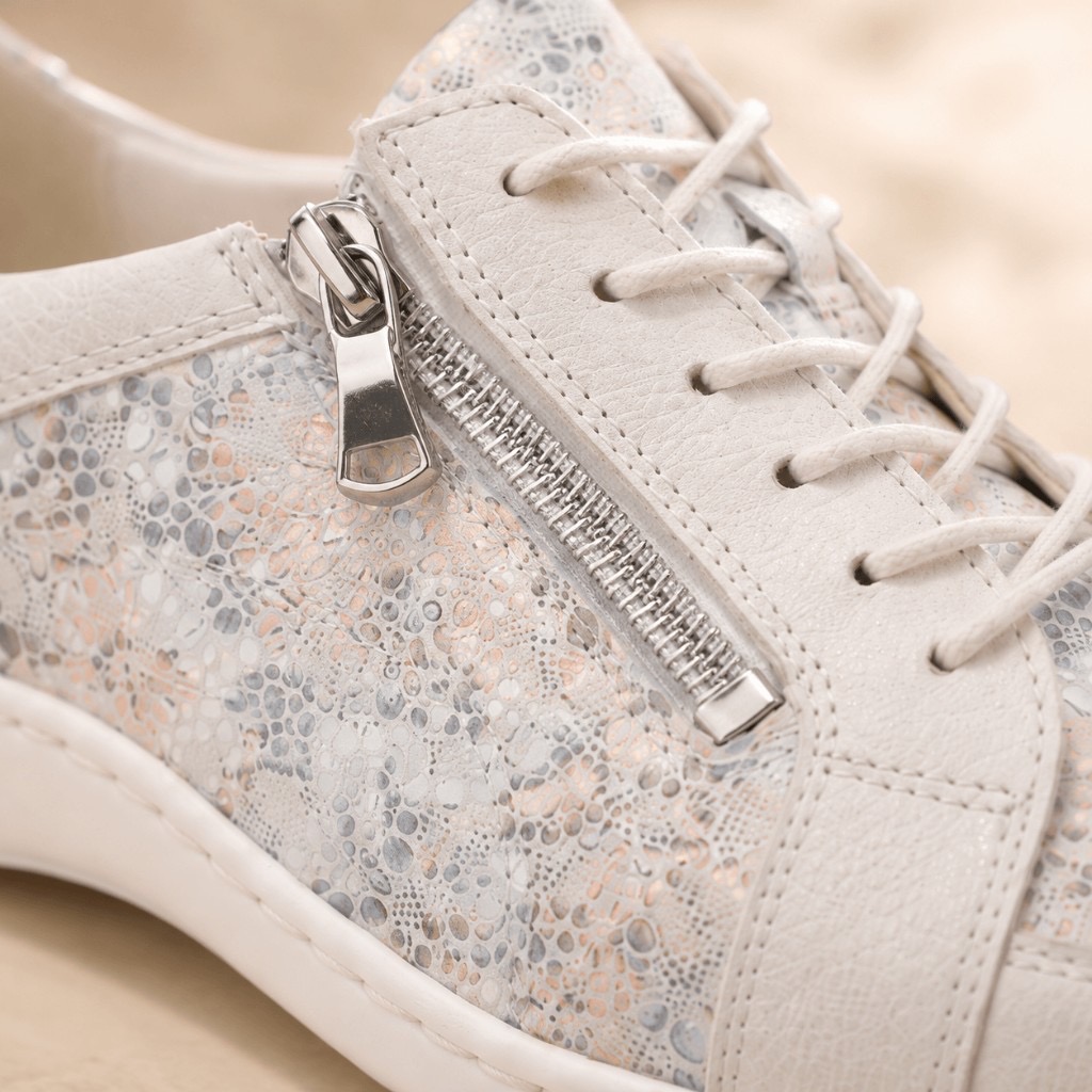 Close-up of Waldläufer Henni leather, snake print and side zip